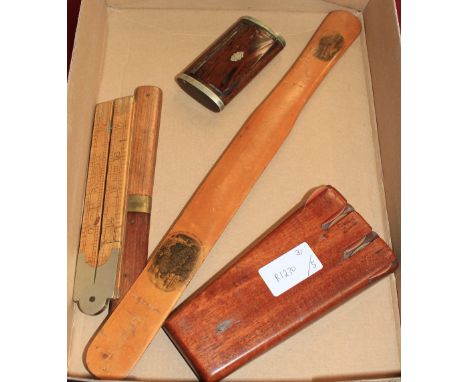 	A walnut and metal bound snuffbox, a mahogany darts case, a Mauchelineware page turner, a campaign knife and fork in a mahog