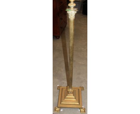 	A brass lamp standard