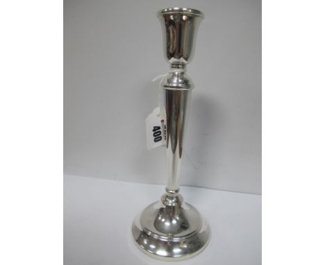 A Hallmarked Silver Candlestick, of plain tapering design, 25.5cm high (base weighted).