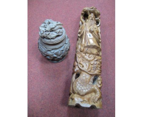 A Heavily Carved Oriental Hardwood Tea caddy, with brass lining, 17.5cm high, a similar later figure. (2)