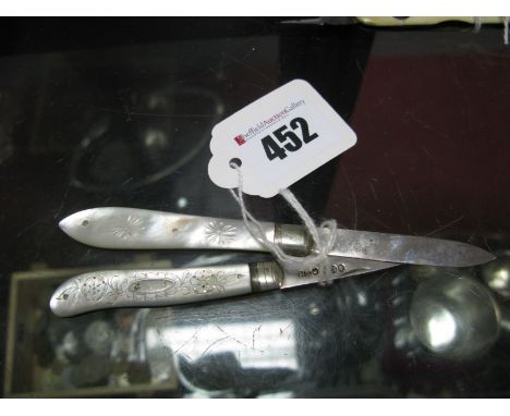 Two Hallmarked Silver and Mother of Pearl Folding Fruit Knives, T.M, Sheffield 1862; J.Y.C, Sheffield 1910, each with decorat
