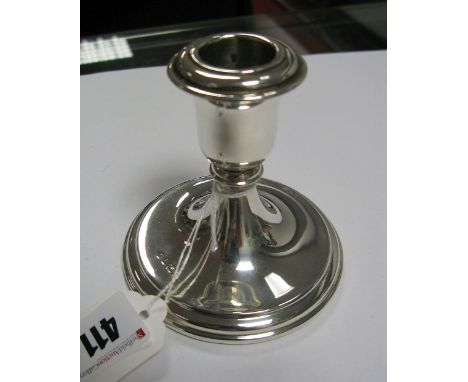 A Hallmarked Silver Dwarf Candlestick, of plain tapering design, 9.5cm high (base weighted).
