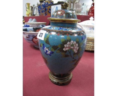 An Early XX Century Japanese Cloisonné Enamel Vase and Cover, with dog of fo finial, the ovoid blue ground decorated with flo