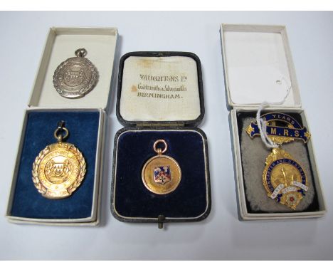 A 9ct Gold and Enamel Medallion Pendant, "Doncaster and District Mines Brigade Rescue", suspended from a 9ct gold and enamel 