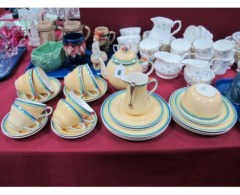 A Booths China 1930's Part Tea Set, including teacups and saucers, breakfast cups and saucers, tea pot, sugar tongs, etc. 