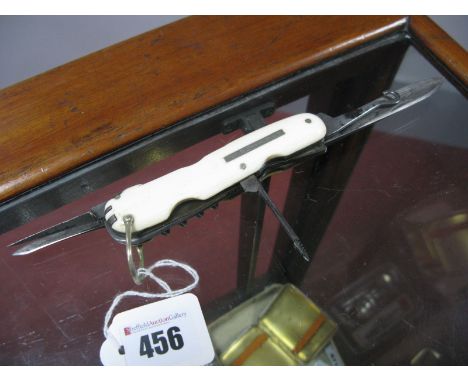 A Hill & Son (4 Hay Market) Multi Blade Folding Knife, including button hook and corkscrew, the plain scales with suspension 