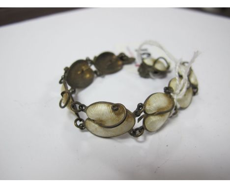 Volmer Bahner; A Danish White Enamel Bracelet, to T-bar and loop style fastener; together with a matching clip earrings. (2)