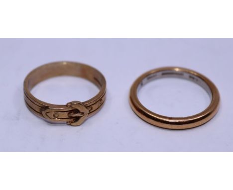 A gold wedding band, weight 4.92g, size N1/2 ,&nbsp; together with a gold buckle ring, weight 2.68g, size N. (2)