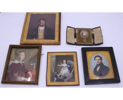 A collection of portrait miniatures including a fine early 19th cent portrait of a child with loyal pet dog