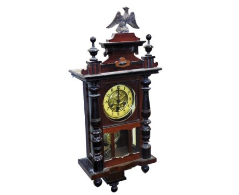 A late 19thC Vienna mahogany cased wall clock, brass dial with chapter ring bearing Arabic numerals, eight day movement with 