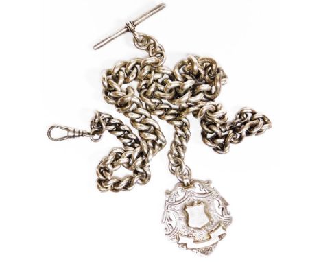 A heavy curb link silver watch chain, with two clip clasps and T bar, together with a shield fob, the main chain 40cm long, w