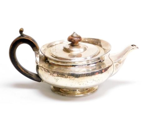 A Victorian silver teapot, of plain form with an ebonised knop and handle, stamped no 7012, Hunt &amp; Roskell, late Storr &a