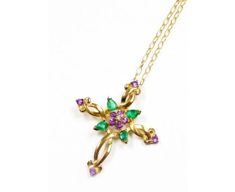 A House of Faberge Violets in the Snow cross pendant and chain, the cross set with amethyst and emeralds, in yellow metal, ma
