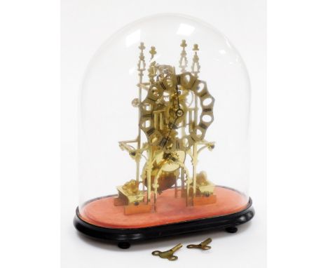 A brass skeleton clock, with shaped finials and a pierced dial with Roman numerals, the base mounted with recumbent lions, in