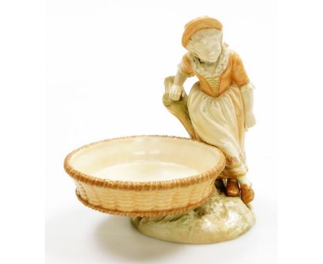 A Royal Worcester blush ivory porcelain sweetmeat dish, formed as a girl in bonnet leaning against a tree stump beside a shal