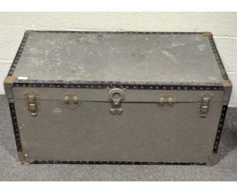 A green painted travelling trunk by Overpond, with metal hinges, locks and edgings, 100 cm x 51 cm x 51 cm