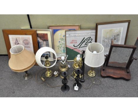 A box of lamps and pictures, including brass and gilt-metal oil lamp bases converted as lamps, a dressing table swing mirror,