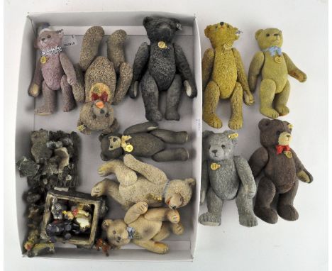 A collection of Steiff ceramic/resin figures, including bears, elephant and more