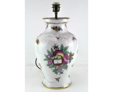 A large 20th century ceramic lamp base, decorated with flowers and insects on a white ground, height 45cm
