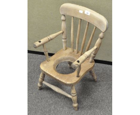An elm child's commode chair, 54.5 cm high