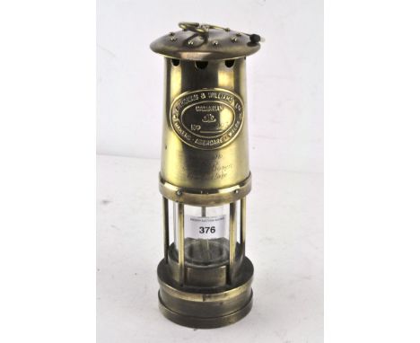 A Welsh presentation miners oil lamp, dated 1986