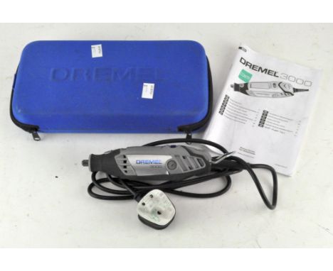 A Dremel 3000 rotary multi toll, with instruction manual, in original case
