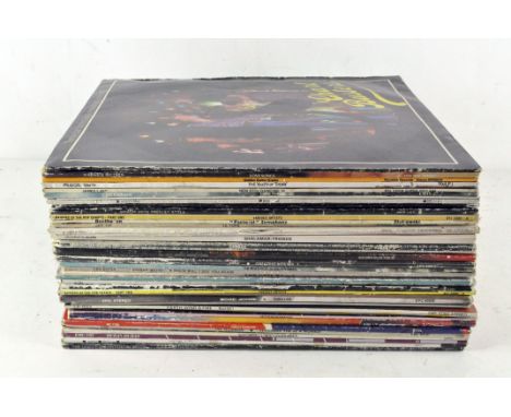 A selection of vinyls, including Blondie, Michael Jackson Thriller, Bee Gees and other artists 