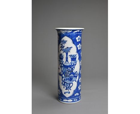 A CHINESE BLUE AND WHITE PORCELAIN SLEEVE VASE, 19TH CENTURY. Of tall cylindrical form with everted rim decorated with treasu