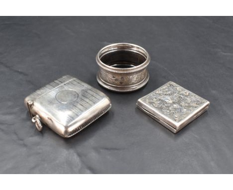 A George V silver vesta case, of traditional design with engine-turned decoration, marks for Birmingham 1919, maker J.C Ltd, 