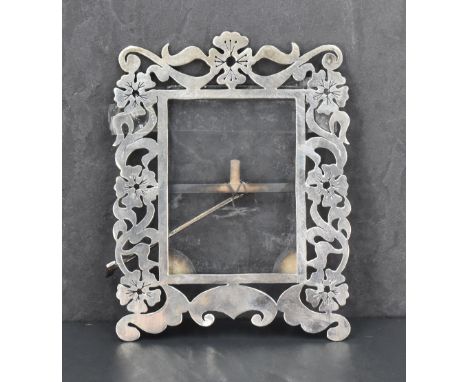 An Egyptian white metal photograph frame, of rectangular form with pierced foliate detail, Egyptian marks verso, 13.5cm, 78gr