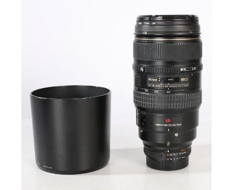 Nikon AF VR Zoom-NIKKOR 80-400mm f/4.5-5.6D lens with soft case and instruction manual.