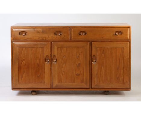 Ercol Windsor three door sideboard. 136cm wide x 82cm high x 46cm deep.&nbsp;