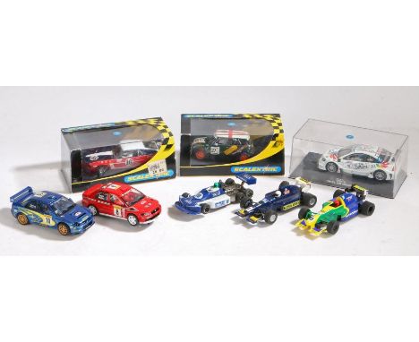 Scalextric March 771, Mitsubishi Lancer and Subaru Impreza WRC, two formula 1 cars, John Cooper challenge Mini, Ford Boss 302