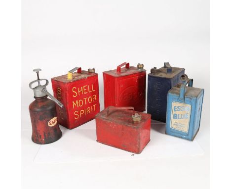 A collection of oil cans, pouring cans, and an Esso oil pump. To include examples from Shell, Pratts, Esso, Castrol, Duckhams