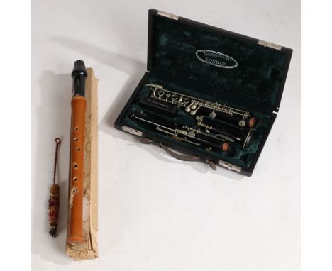 F. Buisson Oboe in a Howarth London fitted case, together with a boxed Rosetti Recorder and cleaning rod.&nbsp;