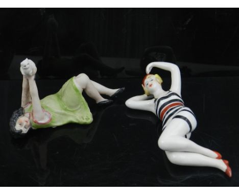 Two Art Deco style ceramic figures of reclining women.