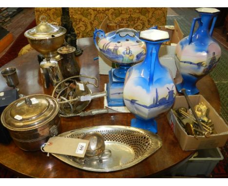 An oval silver bread dish, Sheffield, together with a sucrier, pair of sugar tongs, and a small quantity of platedware includ