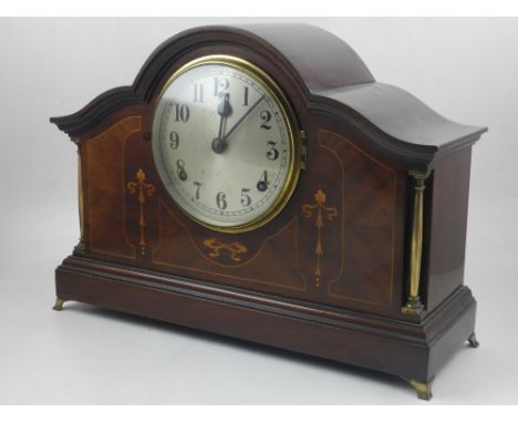 An early 20th century mahogany bracket clock, the silvered dial with Arabic numerals and outer minute track, eight day moveme