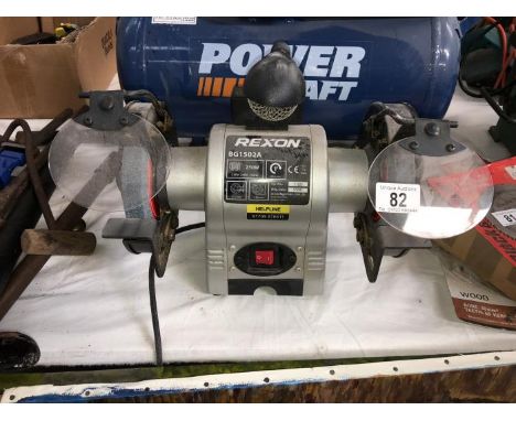 A bench grinder with adjustable light