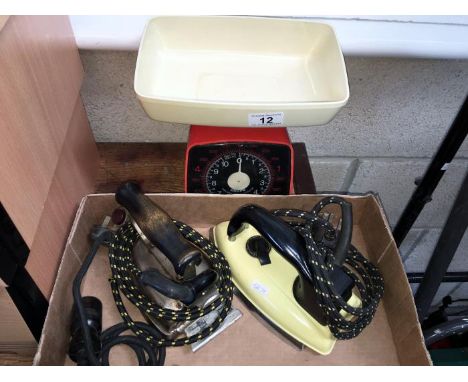 A set of old scales and 2 flat irons