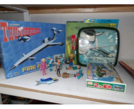 A quantity of vintage Thunderbird toys