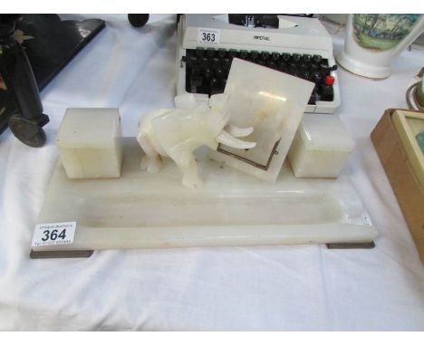 An Onyx desk inkwell surmounted elephant of oryx
