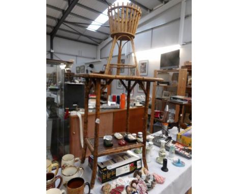 A bamboo table and plant stand