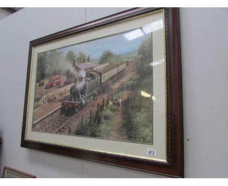 A framed and glazed railway print