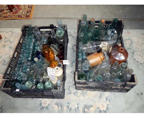 2 trays of glass bottles, lamp chimneys & stoneware