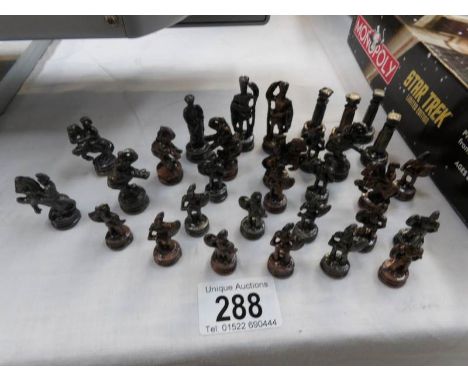 A quantity of model chess pieces