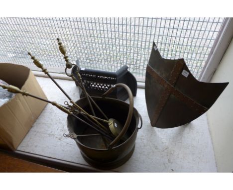 A copper and brass shield firescreen, fire front, brass coal bucket and brass andirons