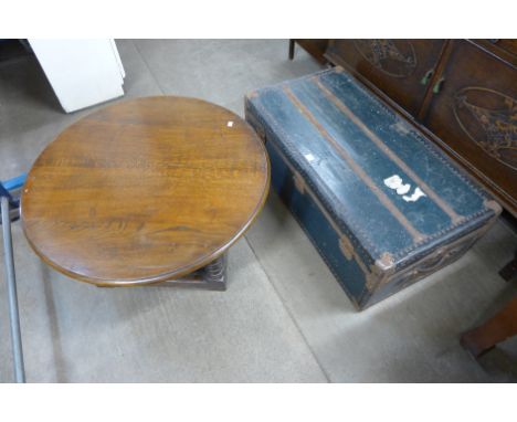 A cabin trunk and an oak coffee table