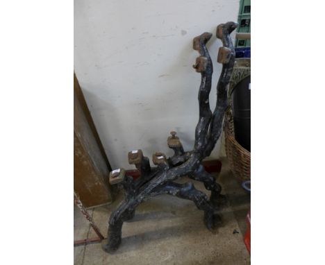 A pair of Victorian cast iron bench ends