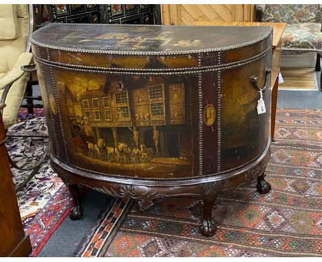 A late 19th / early 20th century studded painted leather d-shaped trunk, painted with tavern and interior scenes, on mahogany